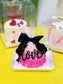 Black Pink Ribbon Cake